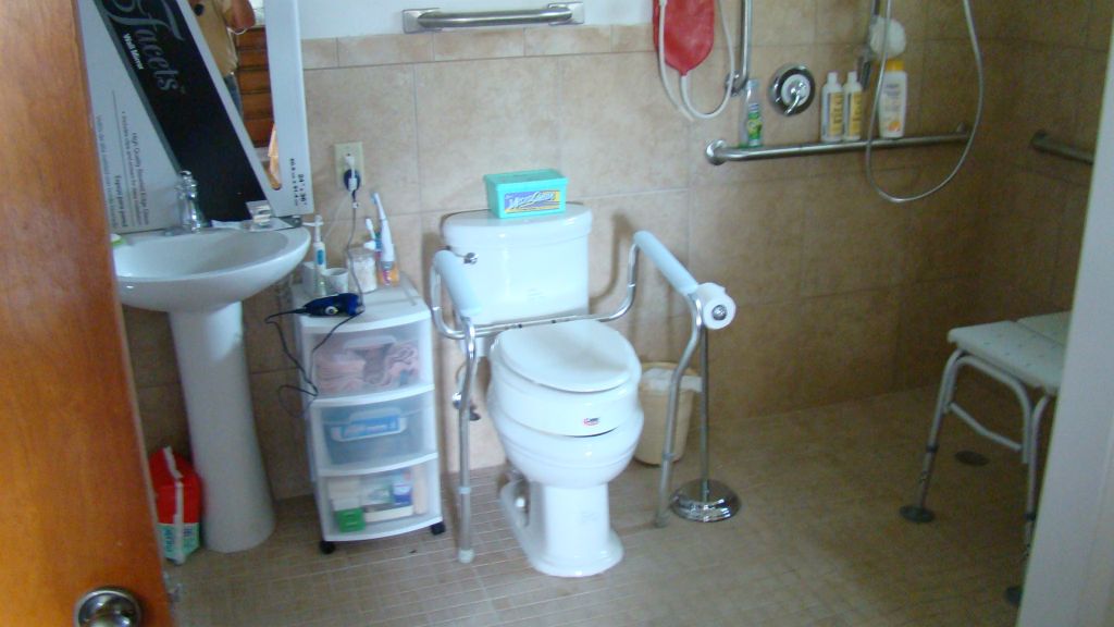 The existing small bathroom is now wheelchair friendly and very accessible